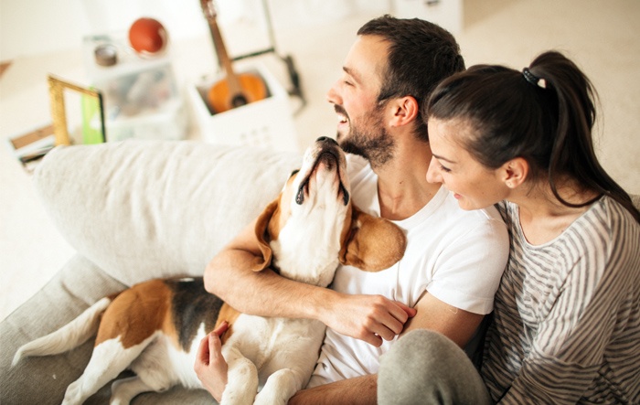 couple with their dog